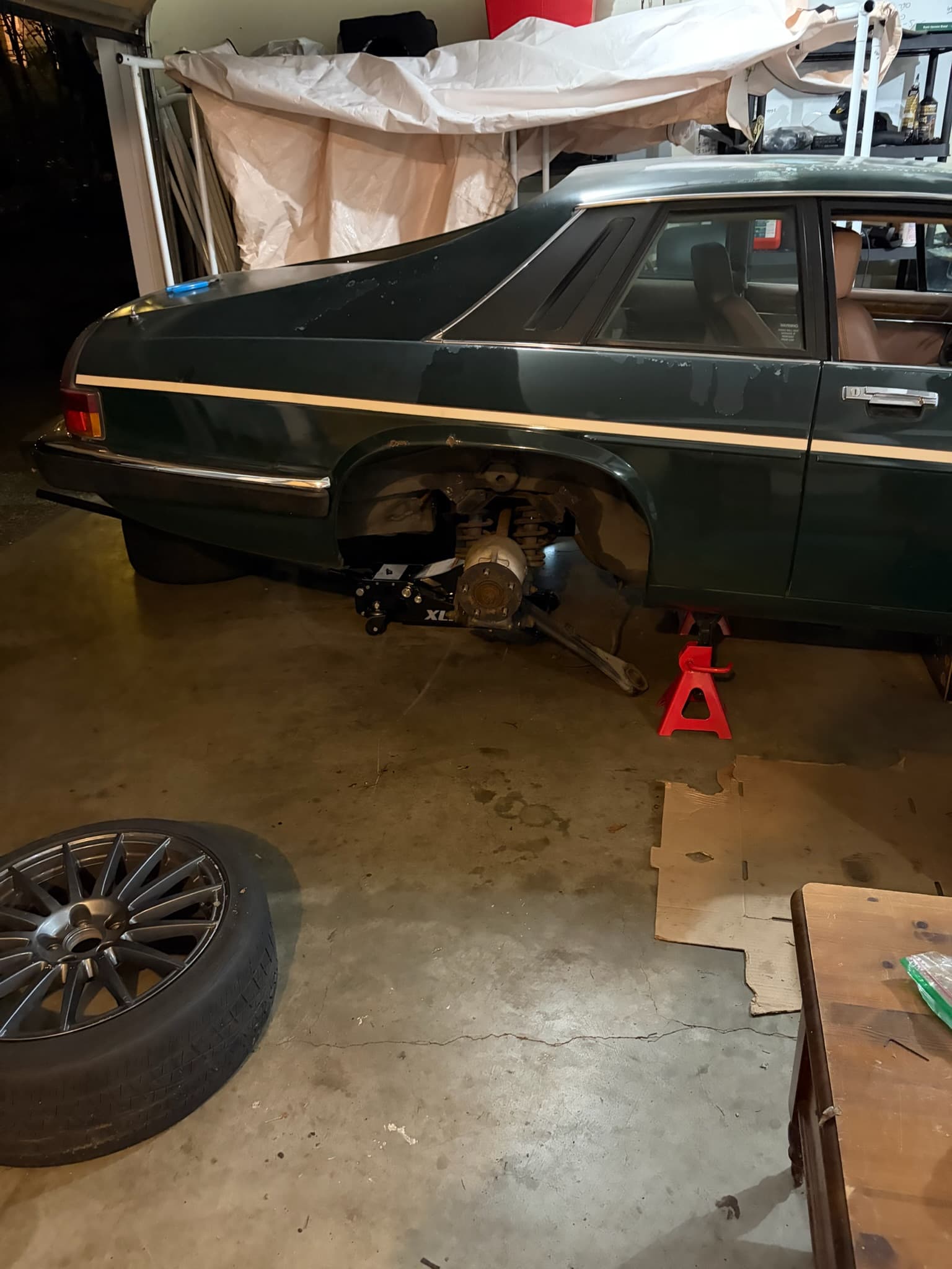 Subframe back in the car, on jack stands